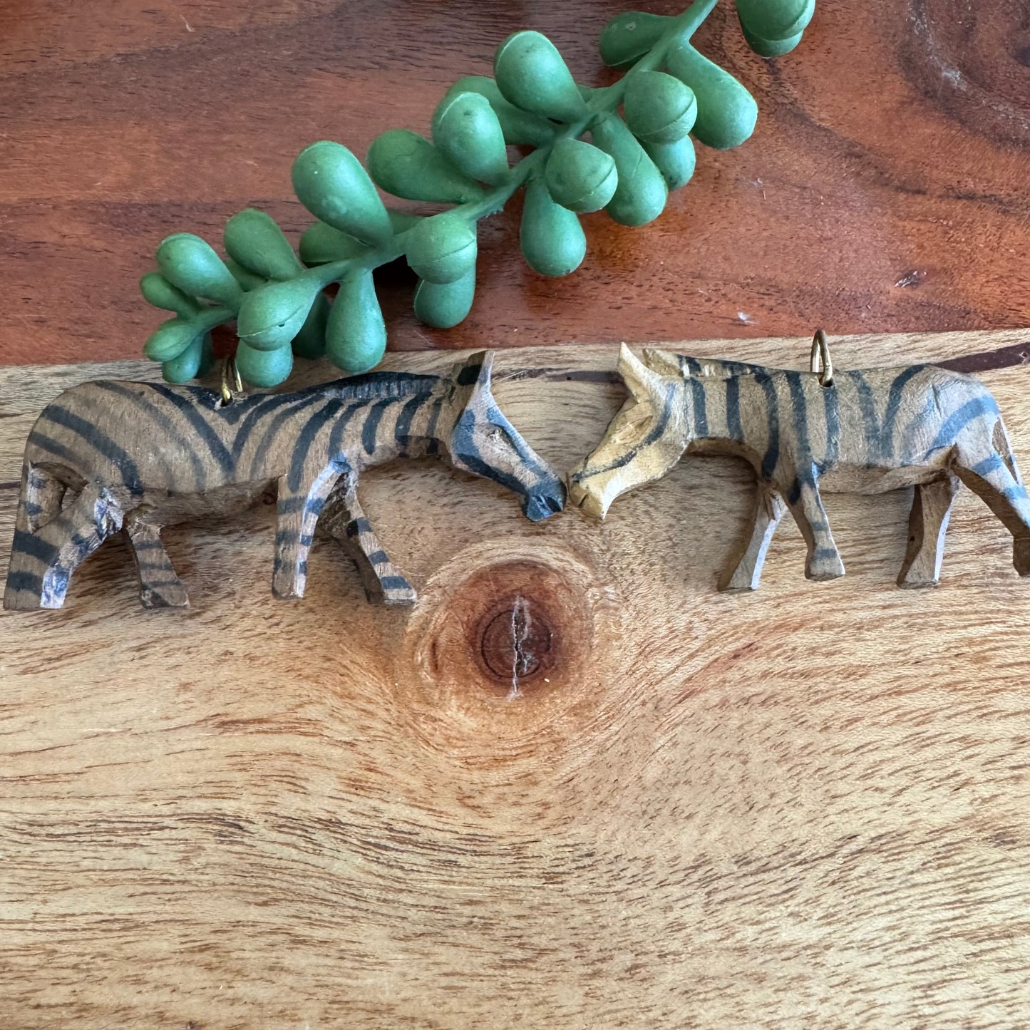 Pair of Vintage Carved African Zebra Pendants