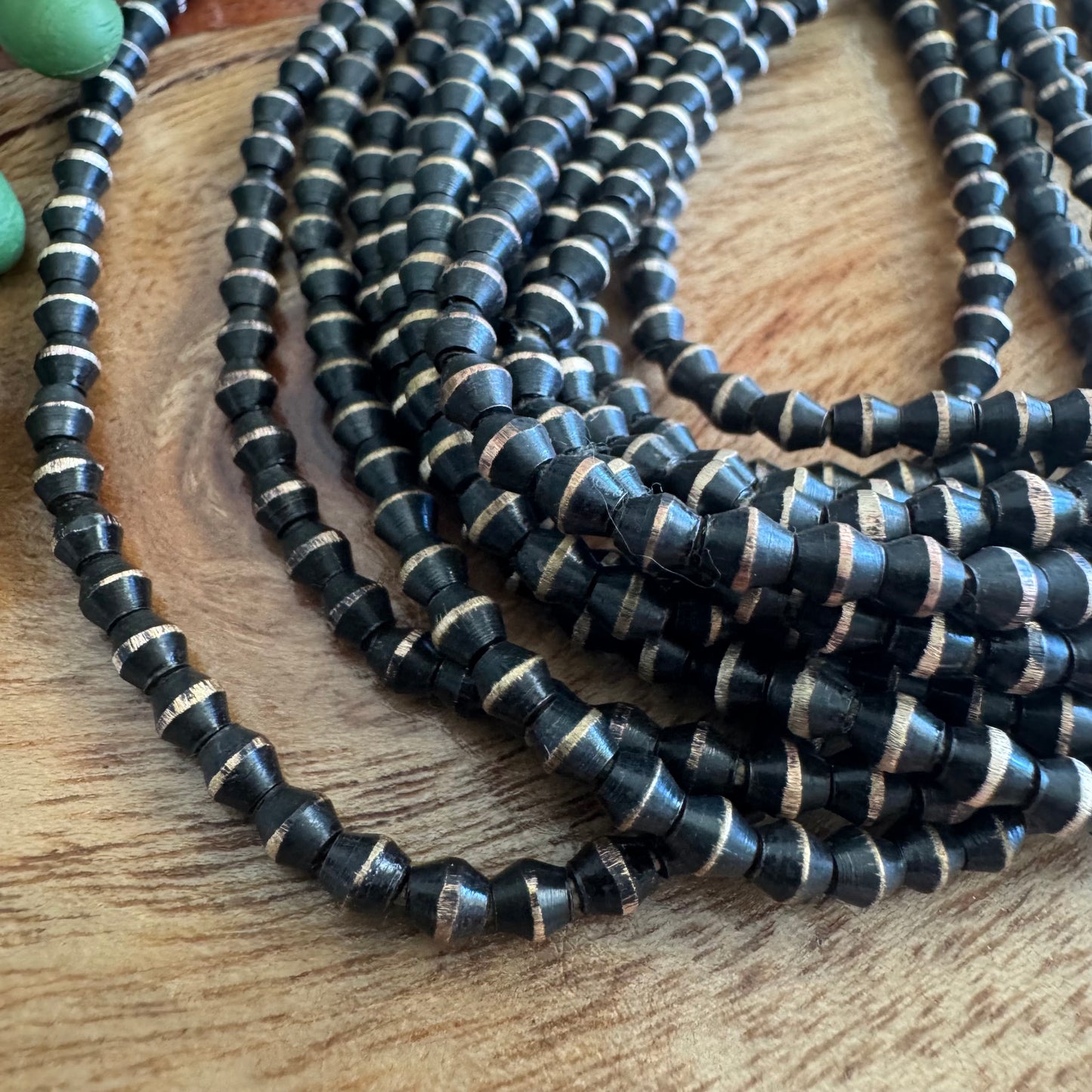 Two-Tone Black and Brass Bicone Spacer Beads – 3.5mm, 24 Inch Strand