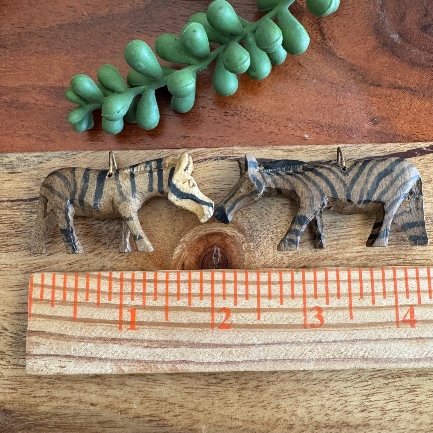 Pair of Vintage Carved African Zebra Pendants
