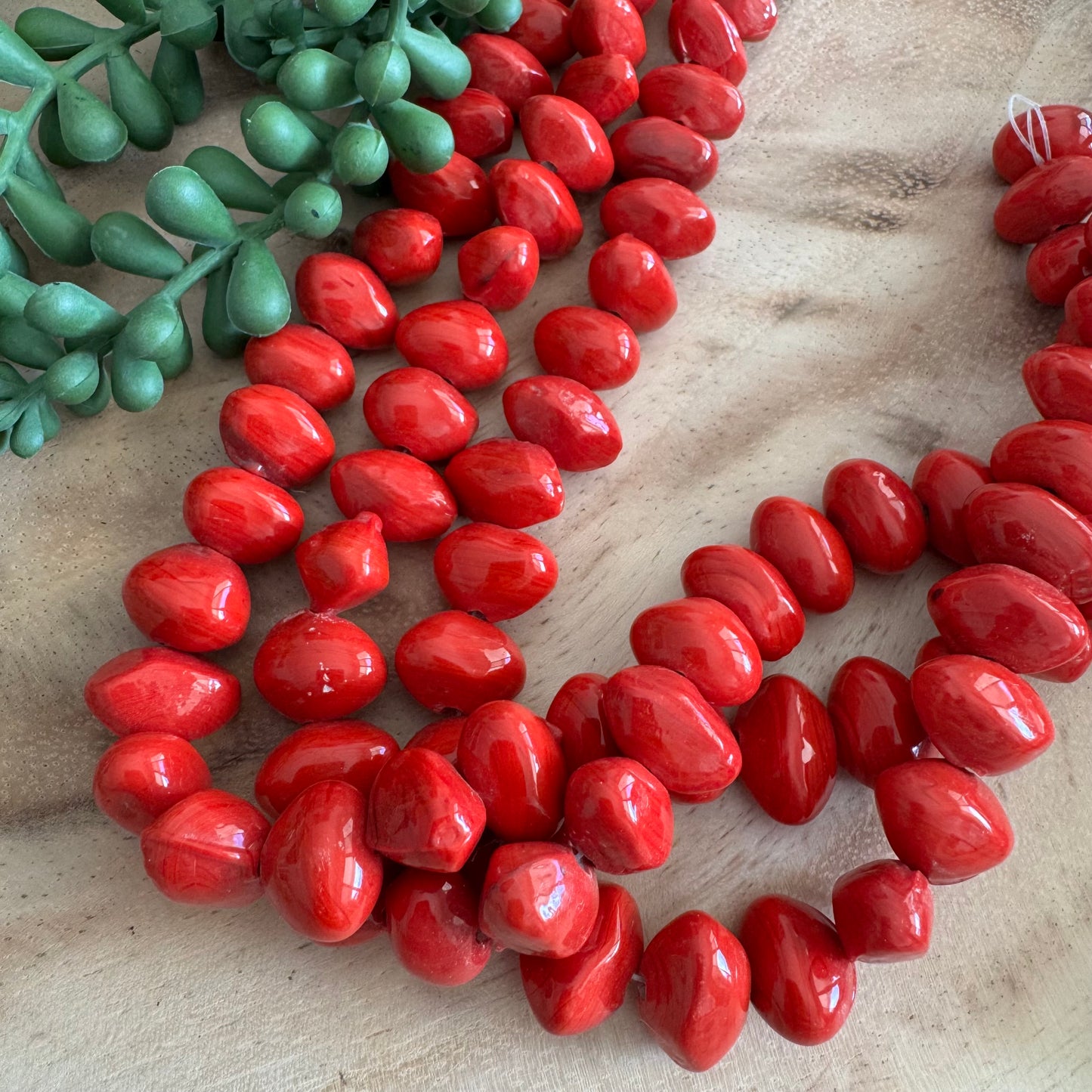 Red Glass Wobble Beads from India – 11x16 mm – 15–16 Inch Strand ING01