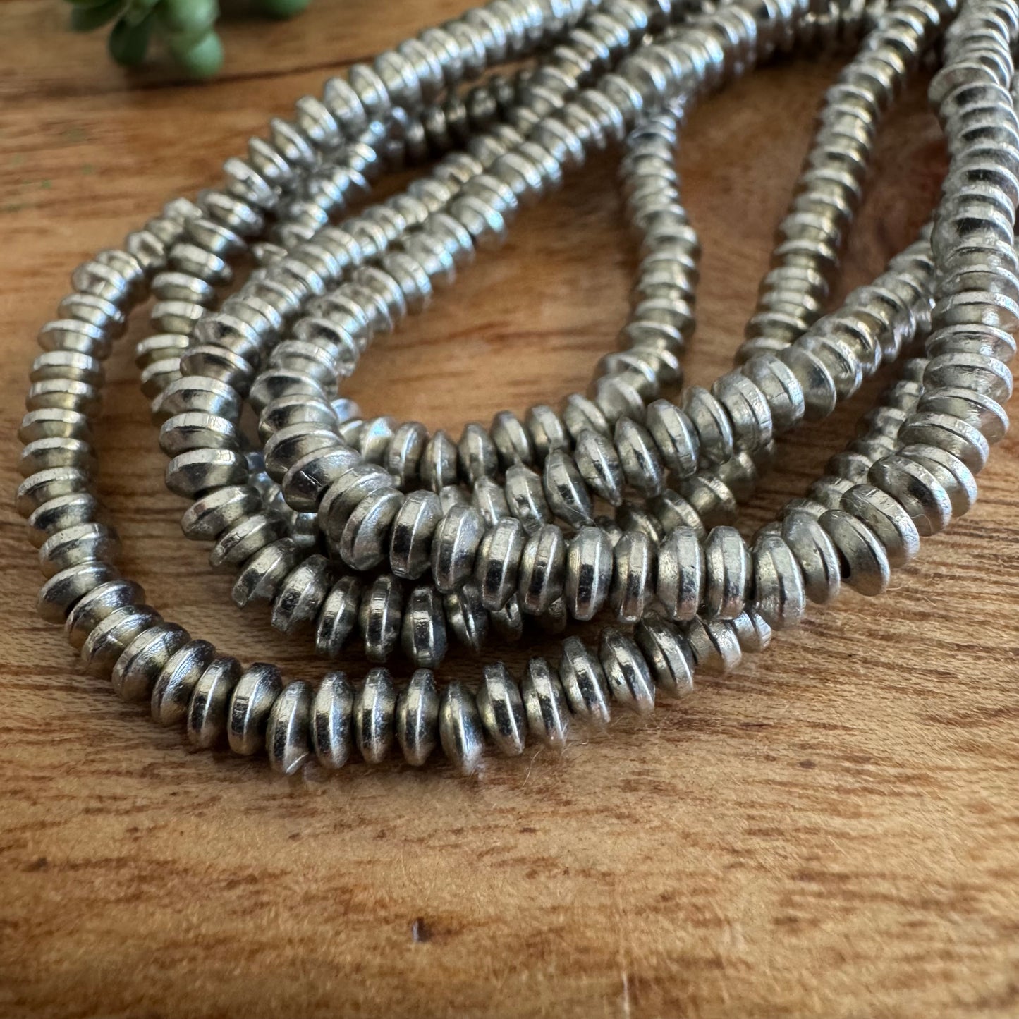 Silver Plated Flying Saucer Spacer Beads – 4mm, 24 Inch Strand