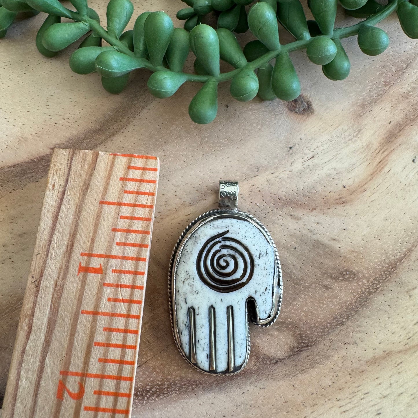 Carved Bone & Silvertone Hand Pendant SWP14