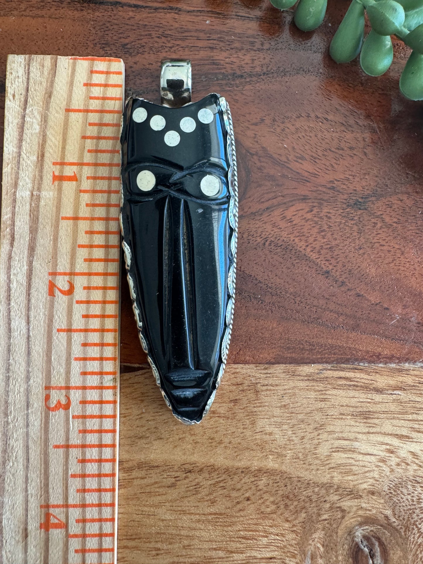 Carved Horn Face Pendant with Embossed Silver Tone Metal