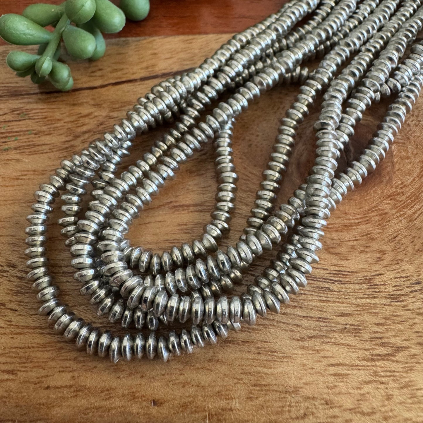 Silver Plated Flying Saucer Spacer Beads – 4mm, 24 Inch Strand