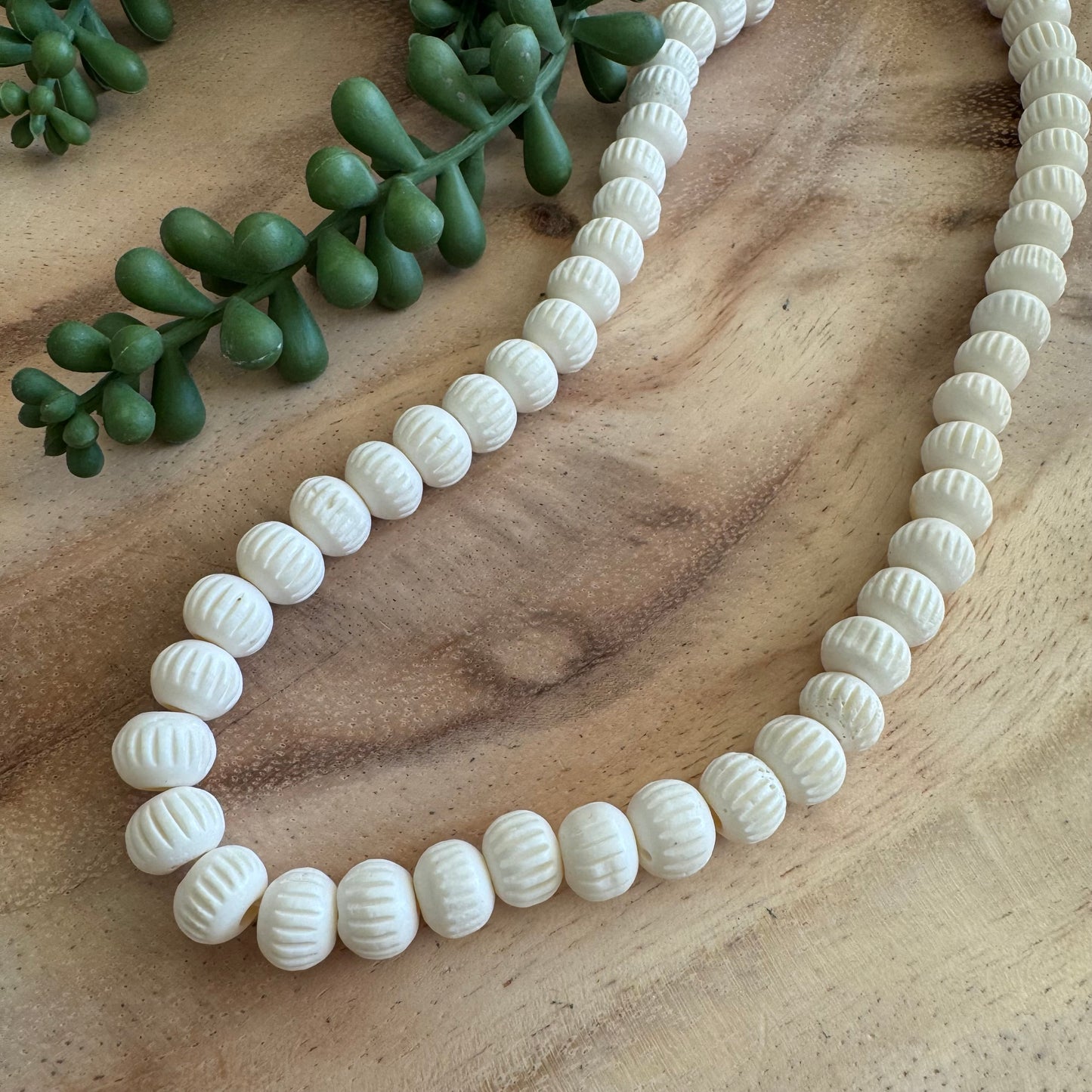 Carved Bone Beads – 8x10 mm – 15–16 Inch Strand – BN12