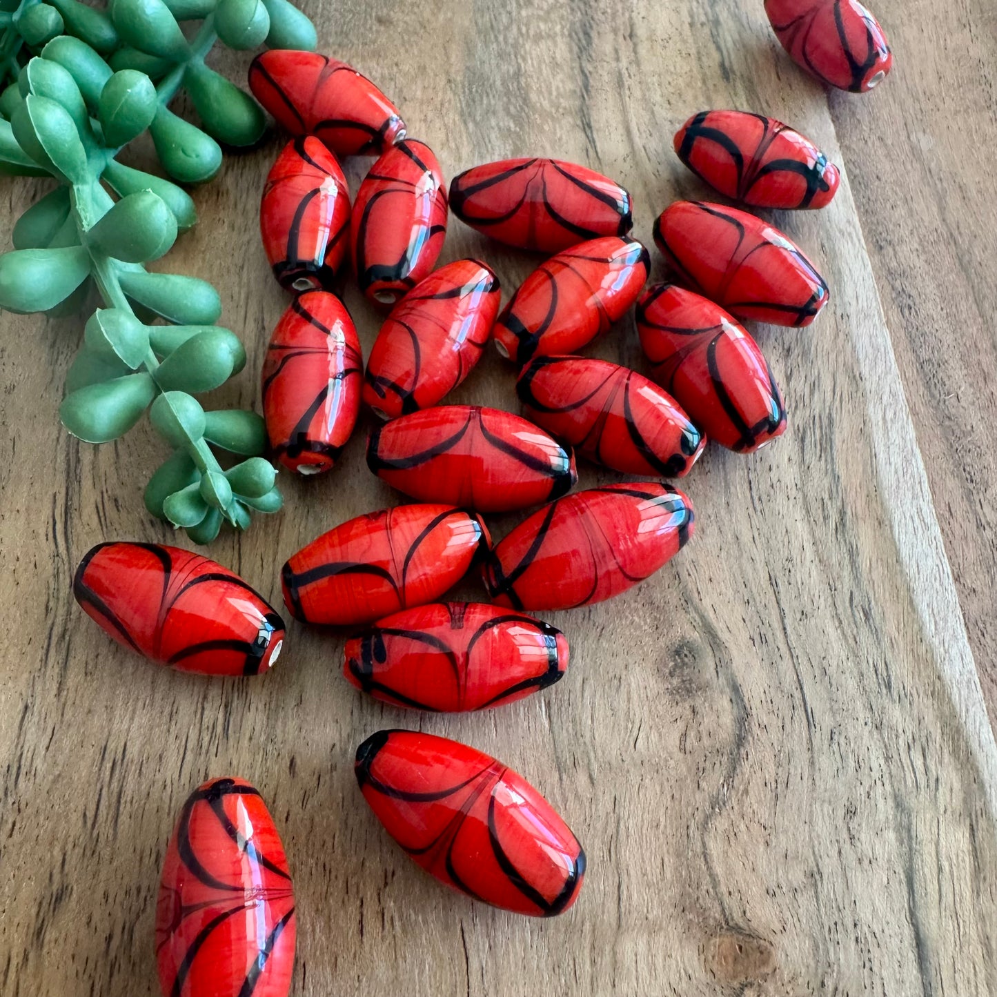 Red & Black Swirled Glass Beads | 20 Pieces - 12x24mm (India)