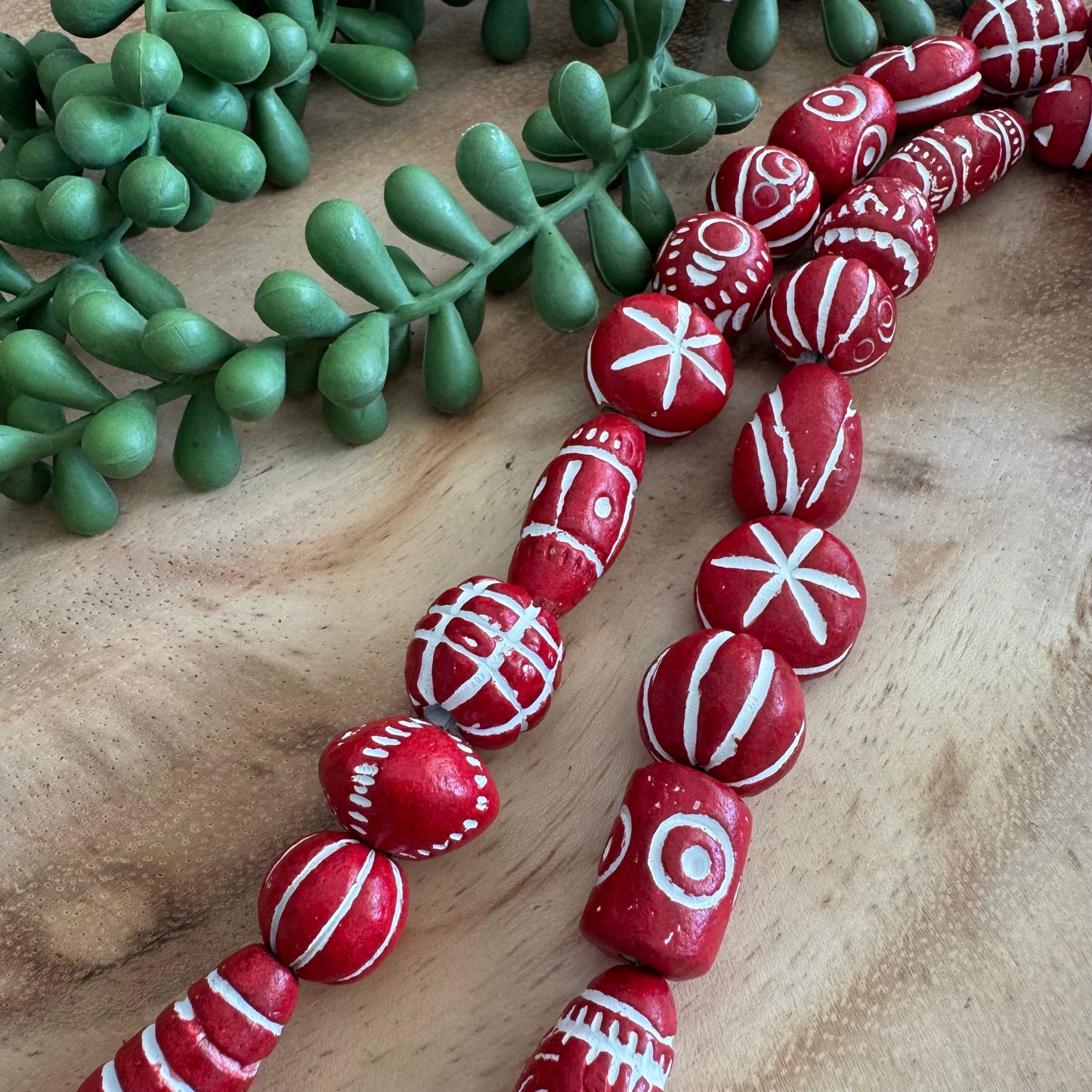 Carved Clay Beads – 14–28 mm – 11 Inch Strand CL01