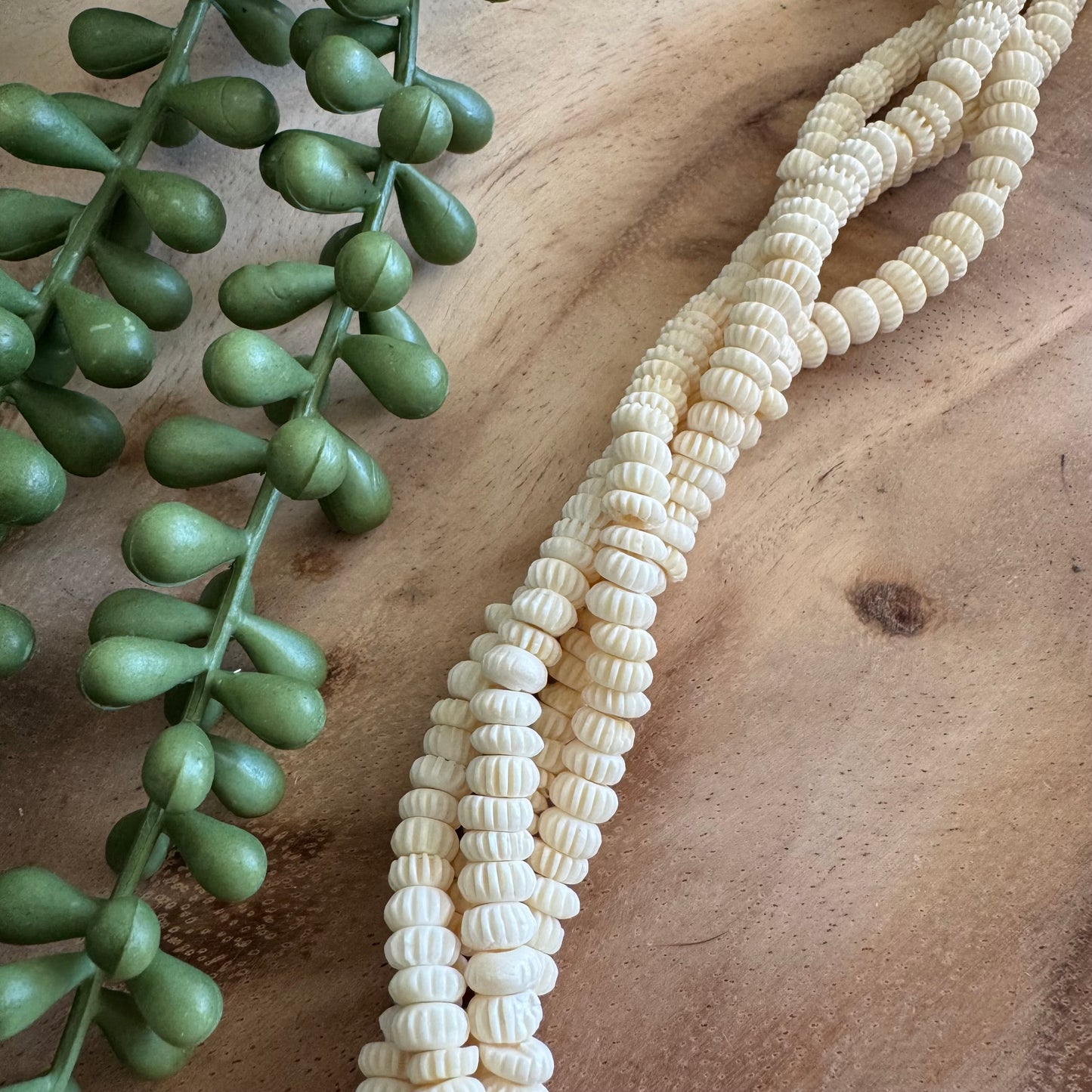 Carved Bone Rondelle Beads – 3-4x7mm – 15–16 Inch Strand BN10