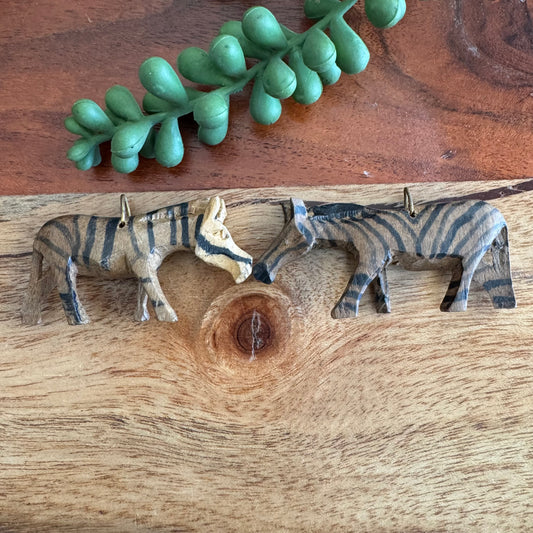 Pair of Vintage Carved African Zebra Pendants