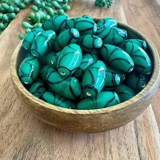 Green & Black Swirled Glass Beads | 20 Pieces - 12x24mm (India)