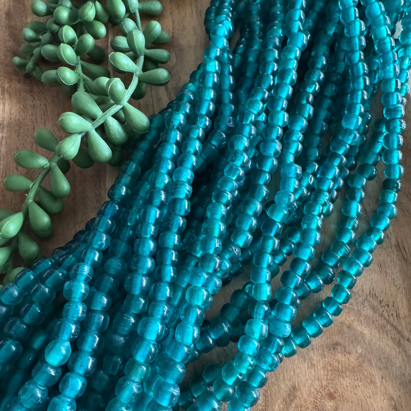 Teal Crow Glass Beads (India)