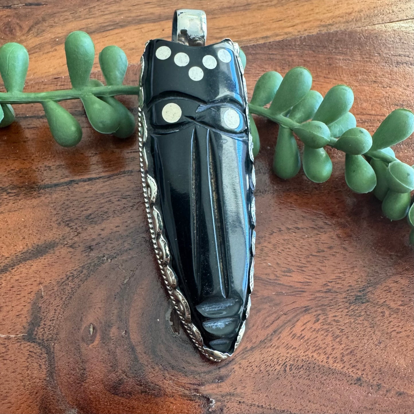 Carved Horn Face Pendant with Embossed Silver Tone Metal