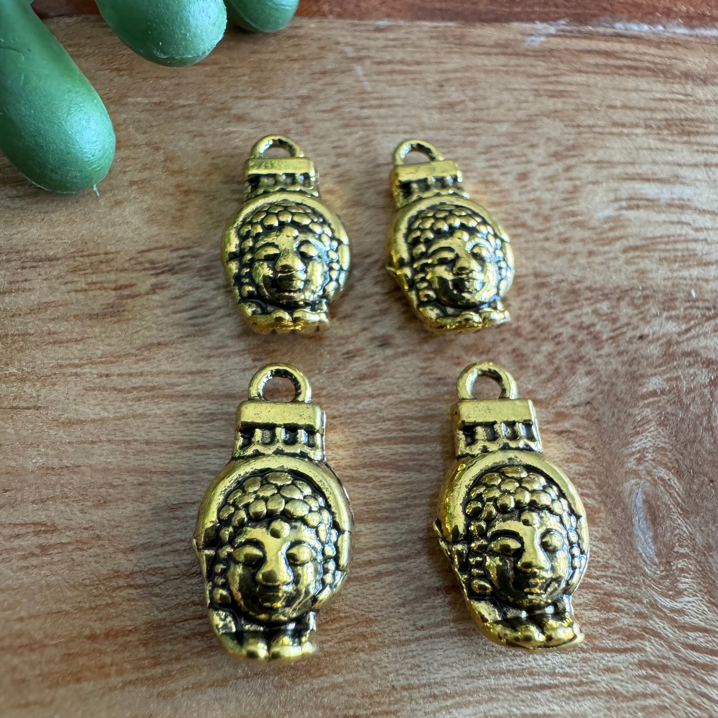 Gold Tone Face and Hand Charm Set