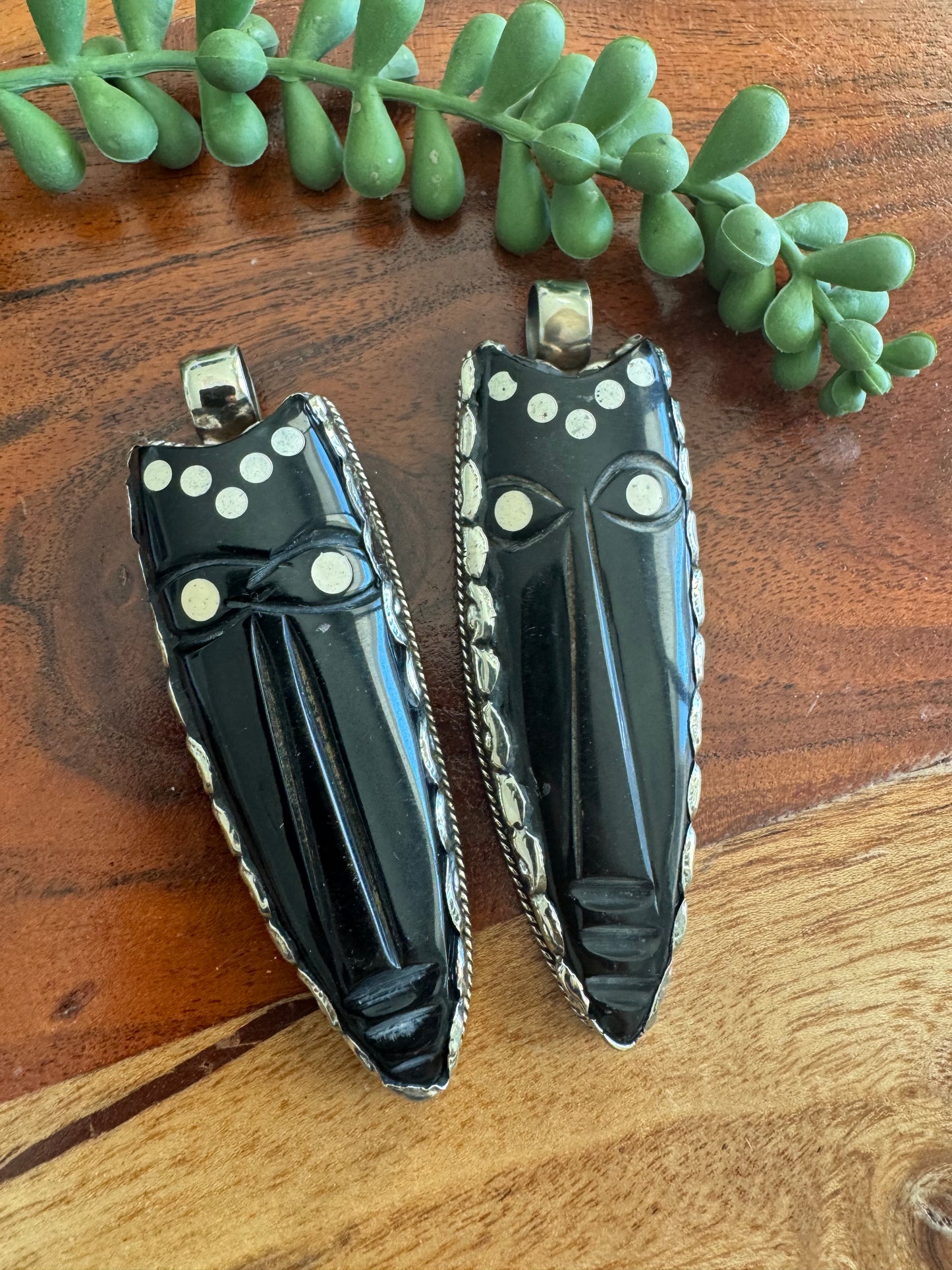 Carved Horn Face Pendant with Embossed Silver Tone Metal