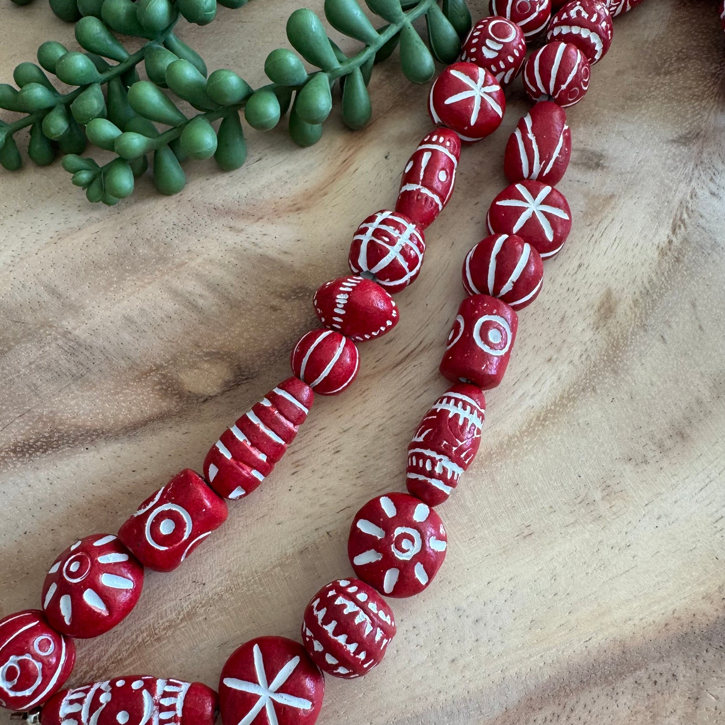 Carved Clay Beads – 14–28 mm – 11 Inch Strand CL01
