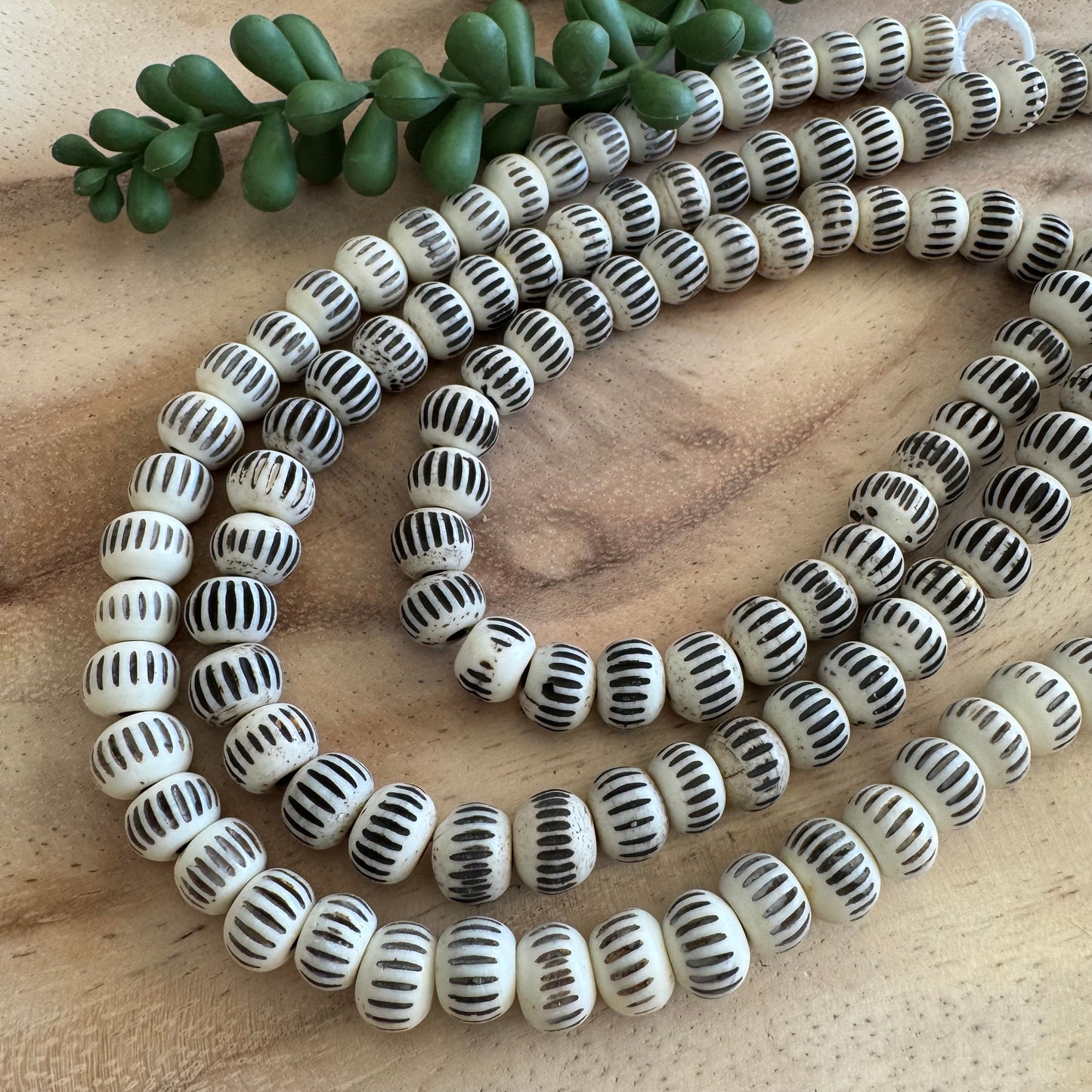 Carved Bone Beads – 8x10 mm – 15–16 Inch Strand – BN11