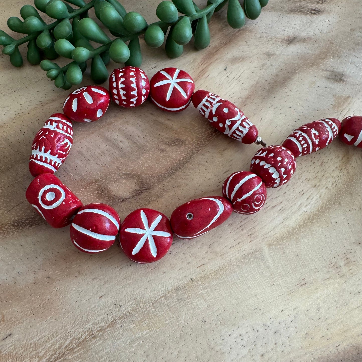 Carved Clay Beads – 14–28 mm – 11 Inch Strand CL01