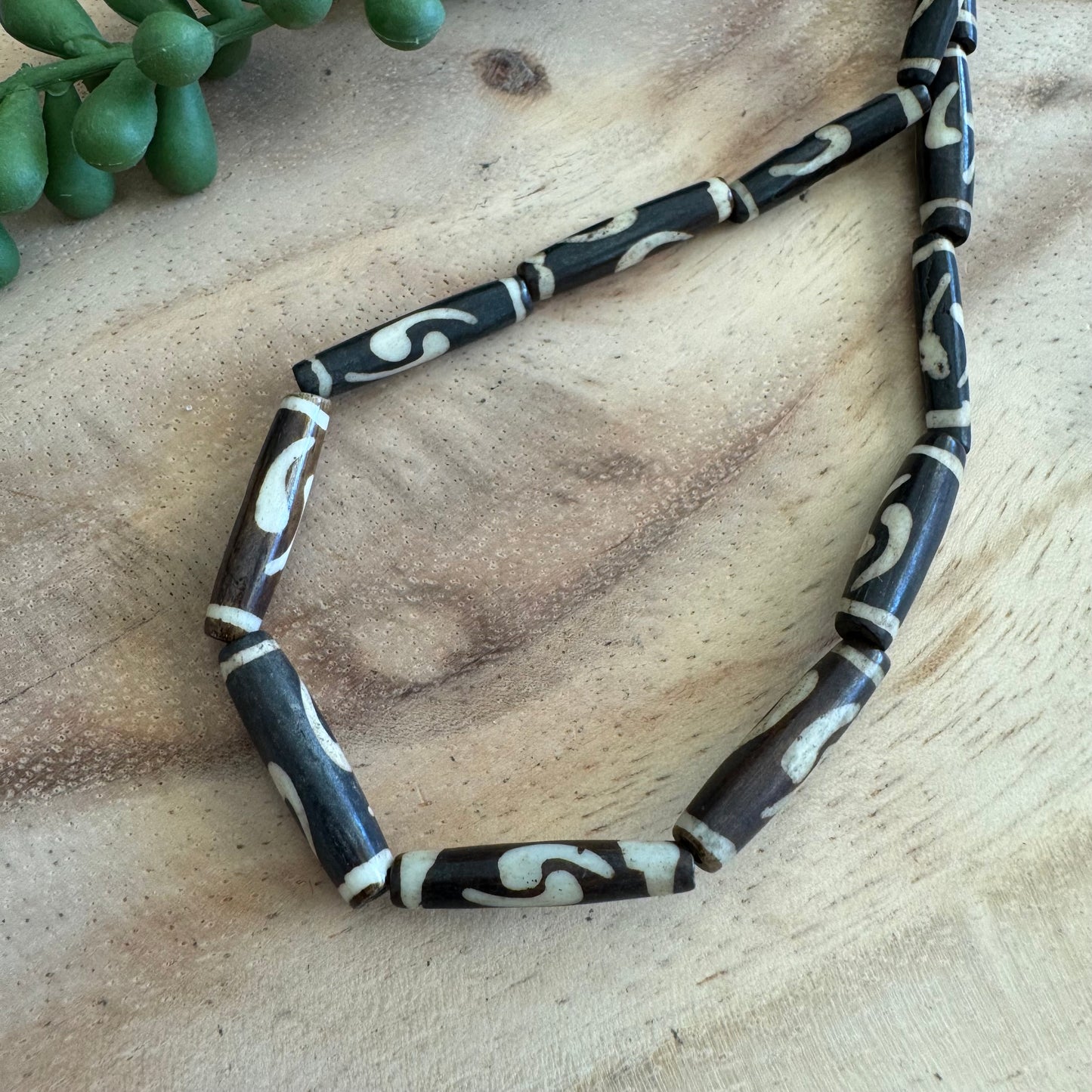 Adinkra Batik Bone Tube Beads – 6x24 mm – 15–16 Inch Strand BN23