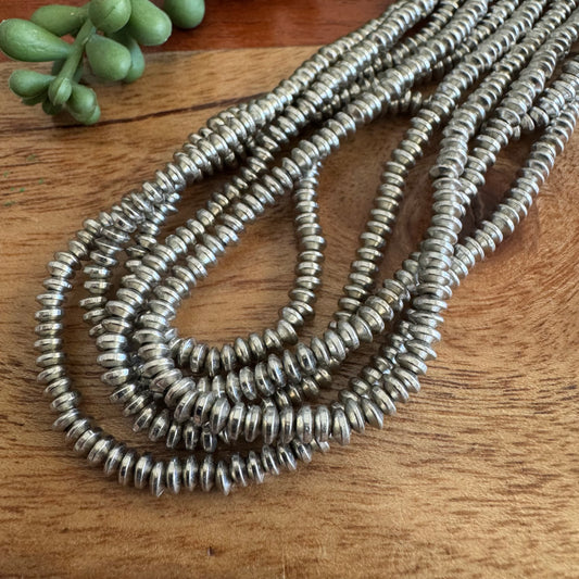 Silver Plated Flying Saucer Spacer Beads – 4mm, 24 Inch Strand